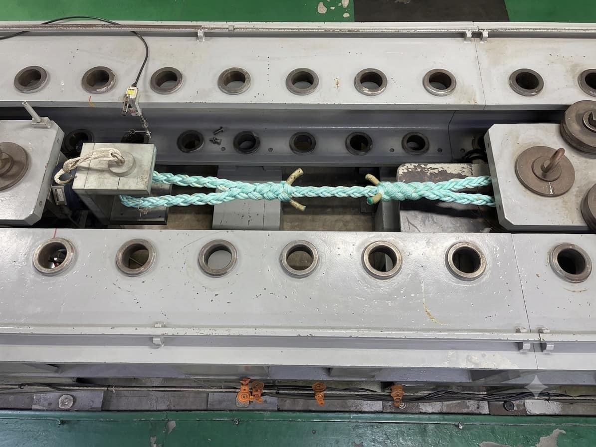 A rope mounted on a testing machine in the Jaya Nets lab